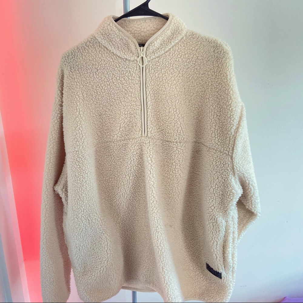ASOS designed oversized shearling half-zip sweatshirt in offwhite.